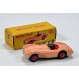 Dinky No. 104 Aston Martin DB3S with pink body, red interior and ridged hubs. E to NM in VG Box.