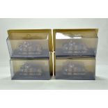 A group of diecast military vehicles. NM to M in Boxes. (4)