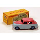 Dinky No. 154 Hillman Minx Saloon with Two tone pale blue / cerise body and blue ridged hubs. E to