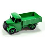 Dinky No. 25w (411) Bedford Open Back Truck in green with ridged hubs. Fine example is E to NM.