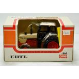 Ertl 1/32 Farm Issue comprising Case 1690 Tractor. NM to M in Box.
