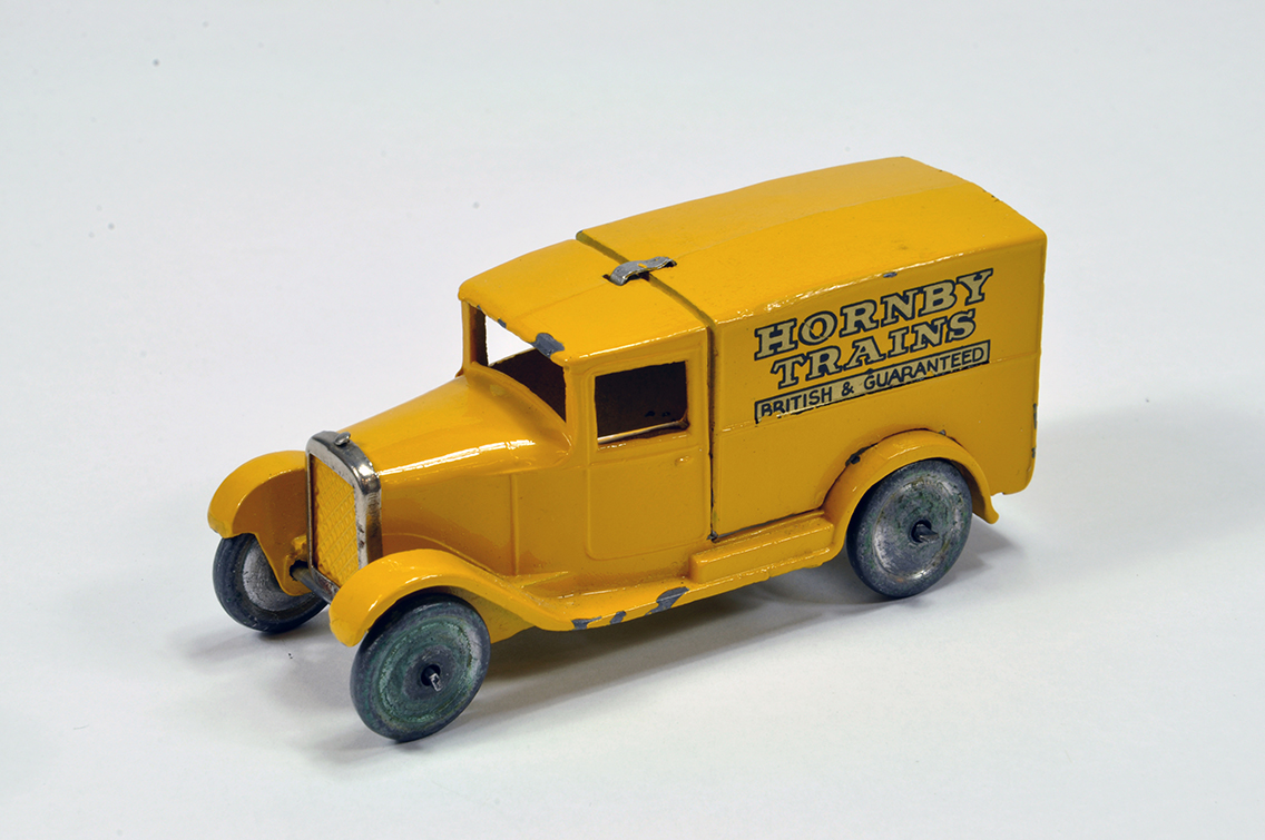 Dinky No. 28A Pre-war Delivery Van Hornby Trains. Yellow with gold lettering with black outline