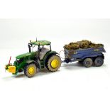 Britains 1/32 Farm Issue comprising John Deere 6150R Tractor and NC Dump Trailer. Models have been