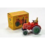 Dinky No. 301 Field Marshall Tractor. Comprising orange body and green metal wheels plus driver.