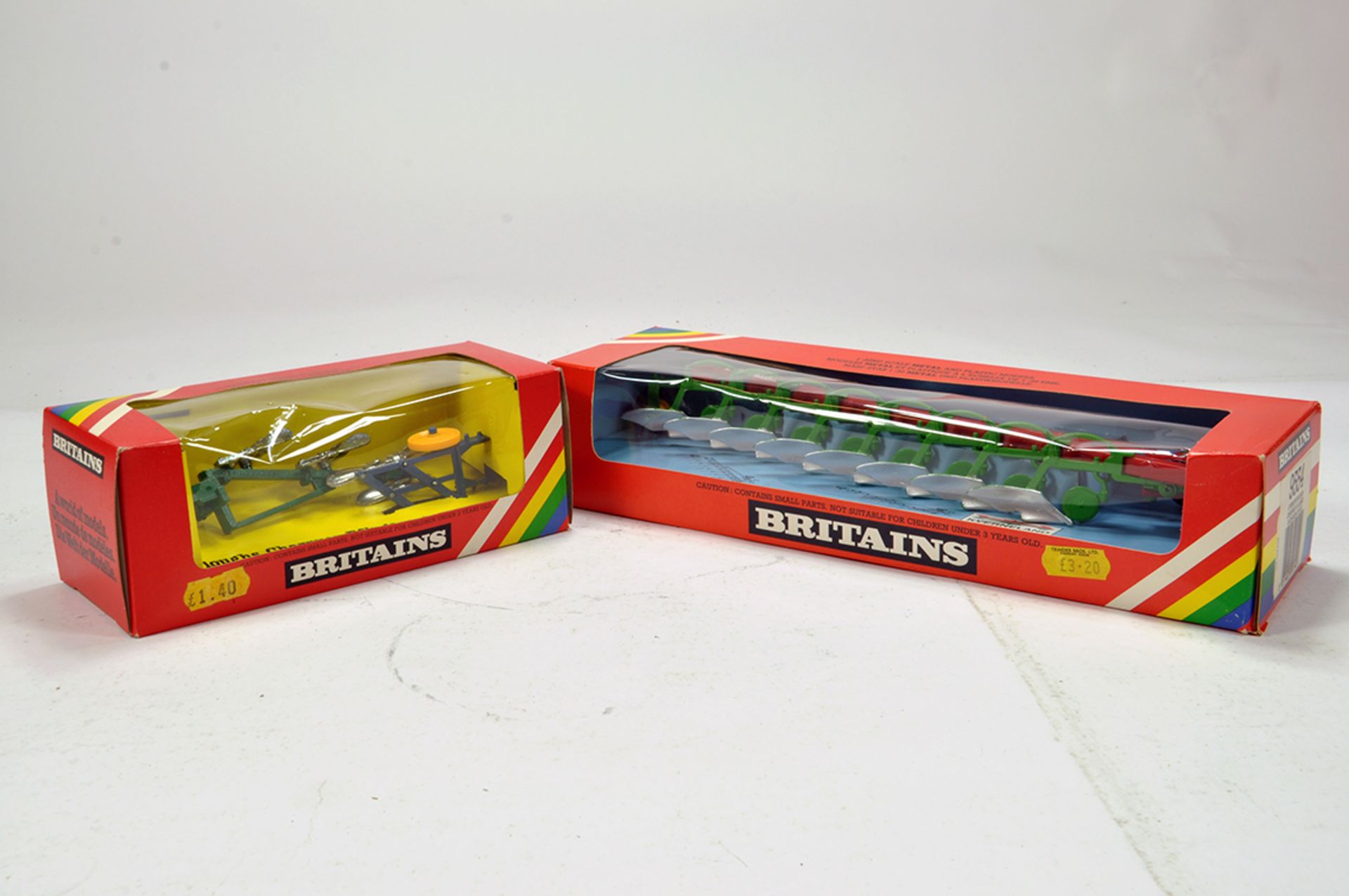 Britains 1/32 Farm Issues comprising Kverneland Plough plus Plough Set. E to NM in Boxes. (2)