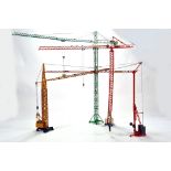 An Impressive selection of assembled tower cranes from NZG Conrad etc. Various issues in need of