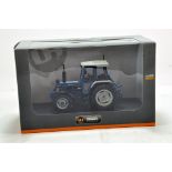 Universal Hobbies 1/32 diecast farm issue comprising Ford 7810 Tractor. NM to M in Box.