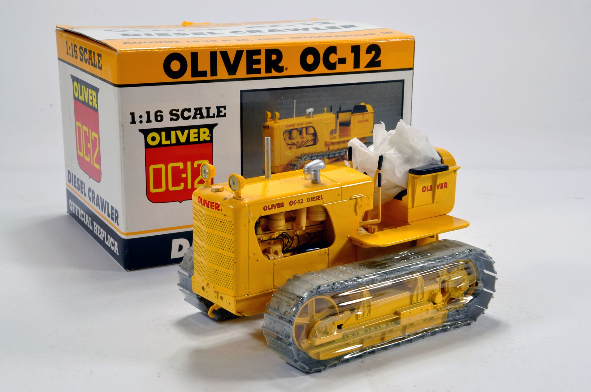 Spec Cast 1/16 Diecast Issue comprising Oliver OC-12 Crawler Tractor. E to NM to M in Box.