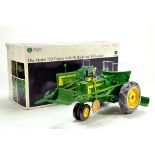 Ertl 1/16 diecast issue comprising John Deere 720 Tractor with blade and loader. Precision issue. VG