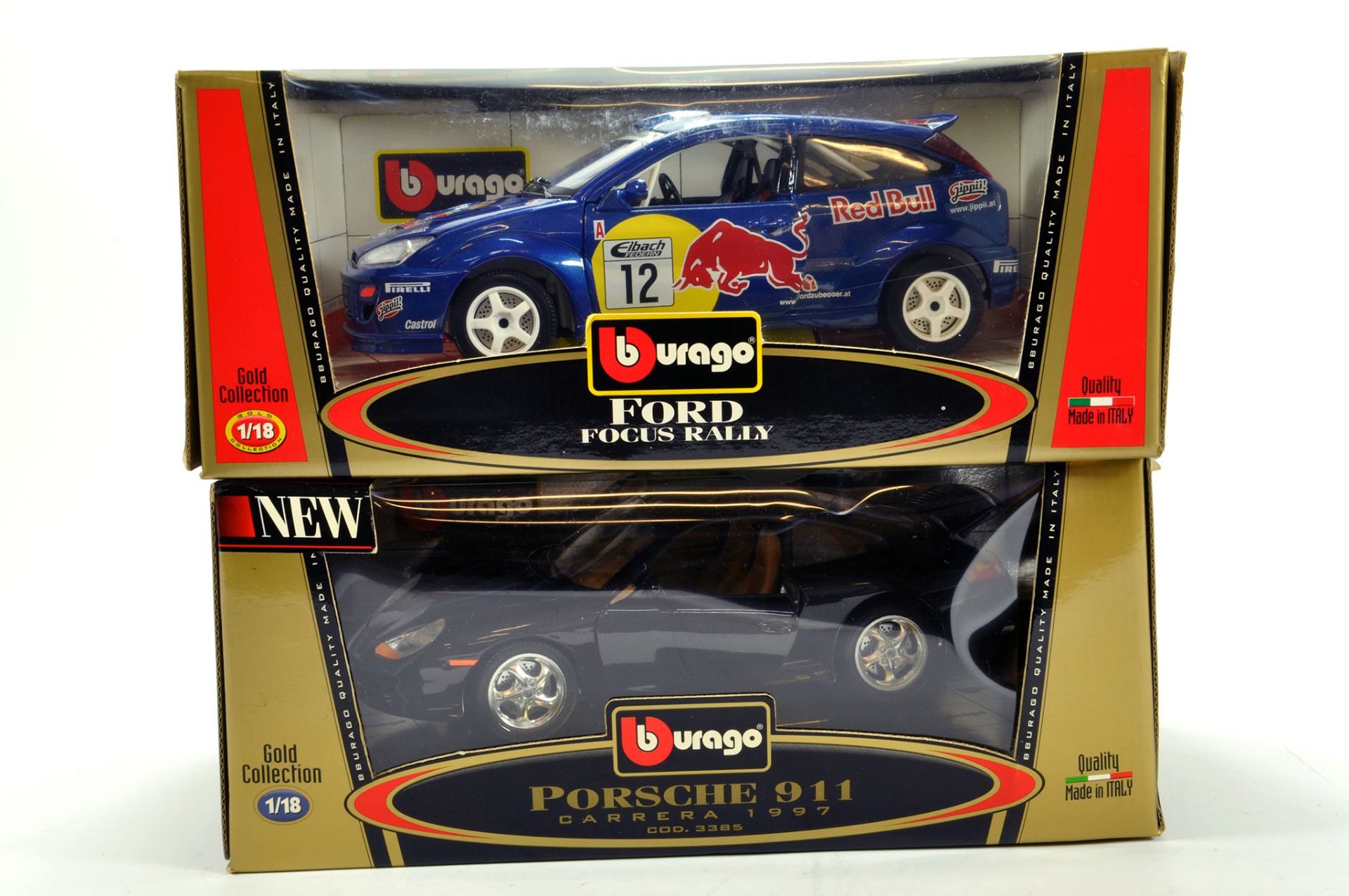 Burago 1/18 diecast issues comprising Ford Focus Rally and Porsche 911. NM in Boxes. (2)