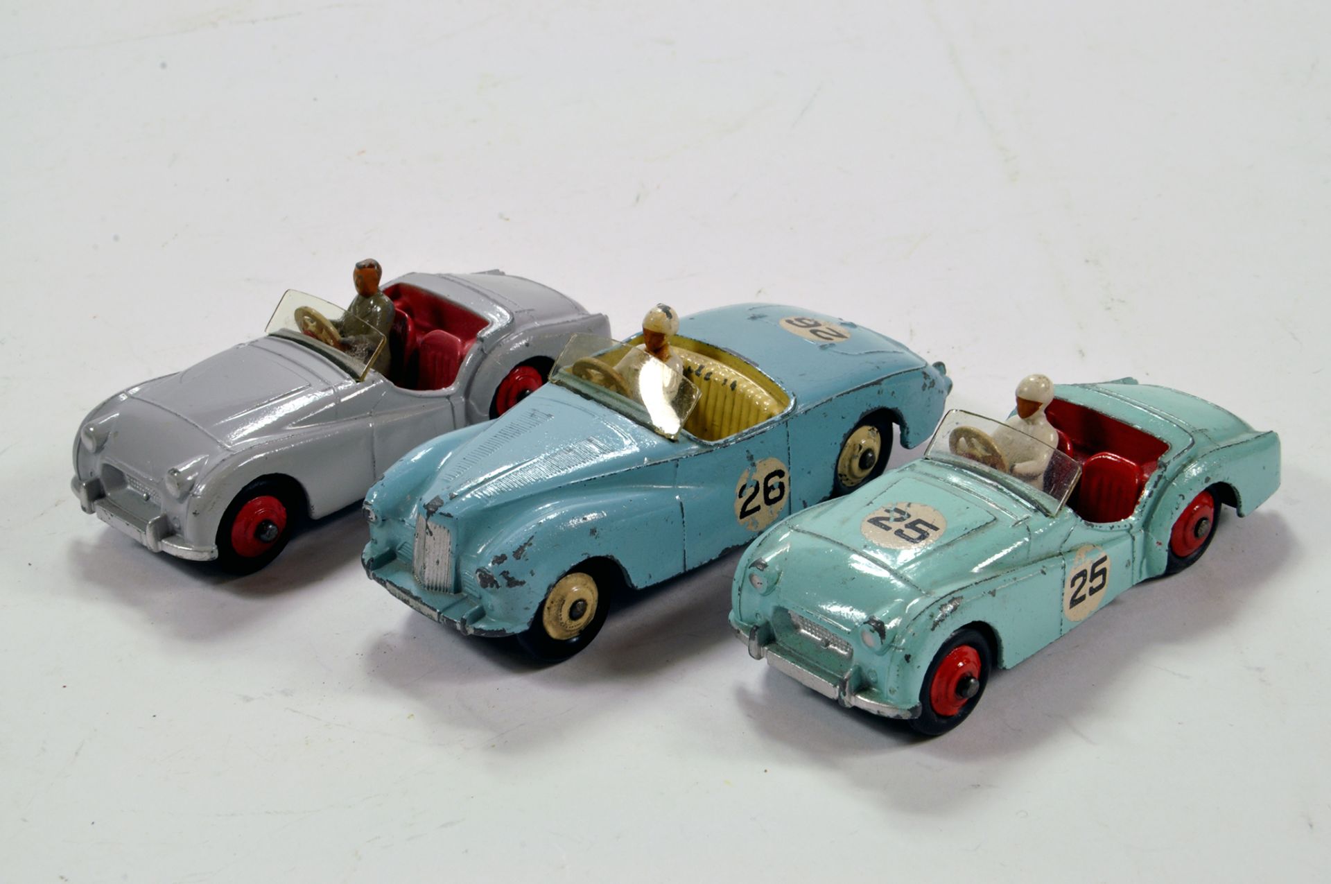 Dinky Trio of Diecast Car Issues comprising Triumph TR2, Sunbeam Alpine and MG Midget. Generally F