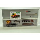 WSI 1/50 diecast truck issue comprising Mercedes Arocs 8X4 and Low Loader in the livery of Ruttle