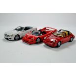 Trio of diecast cars. 1/18. Various makers Generally F to G.