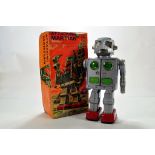 SH (Japan) Attacking Martian tinplate and plastic battery operated issue Robot in silver, red,