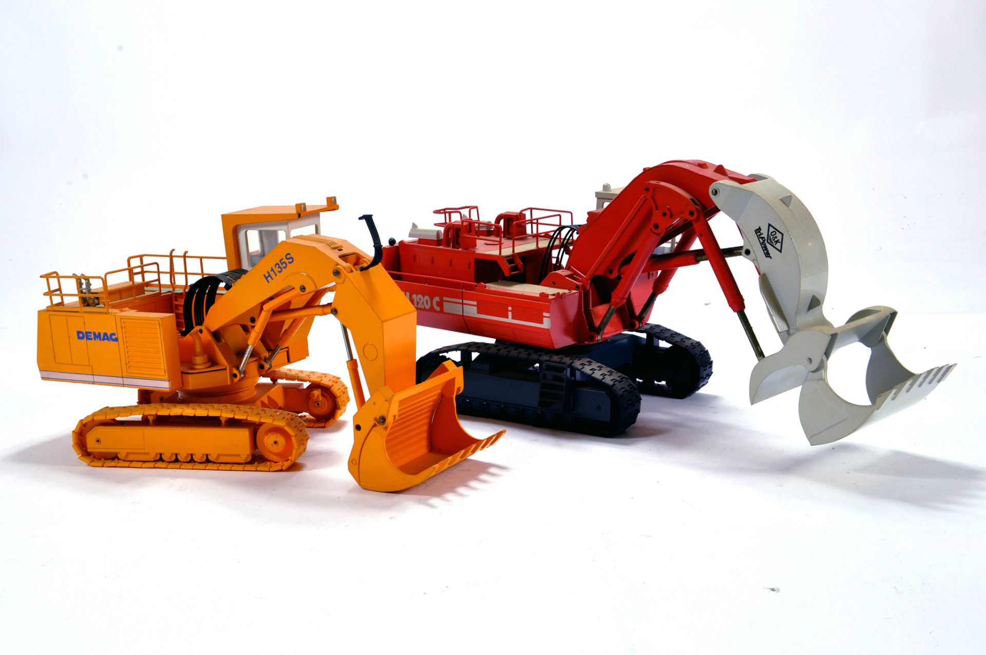 Construction Diecast comprising Conrad 1/50 Demag H135S Excavator plus O&K RH120C. Generally VG to E