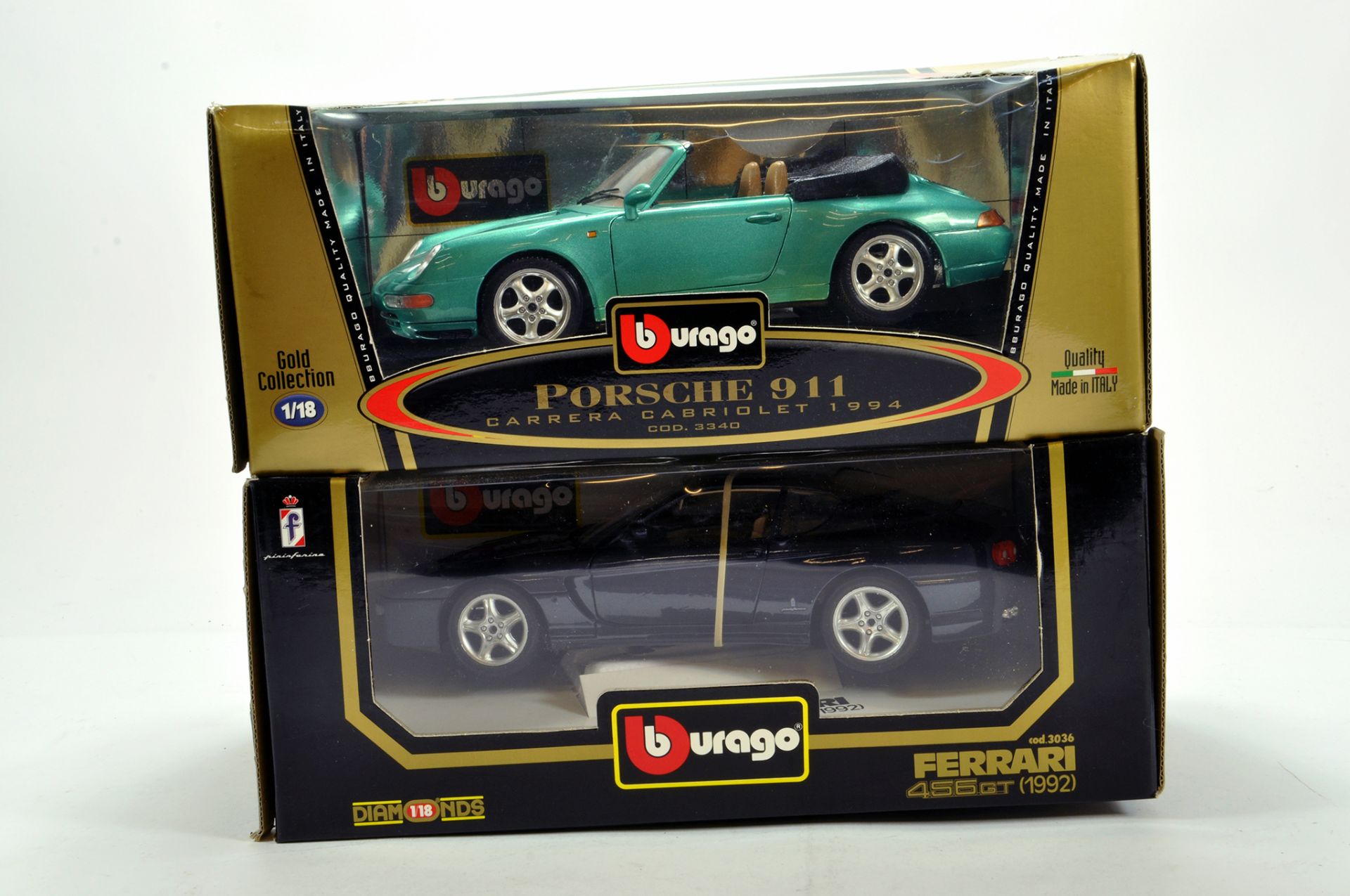Burago 1/18 diecast issues comprising Porsche 911 and Ferrari 456GT. NM in Boxes. (2)