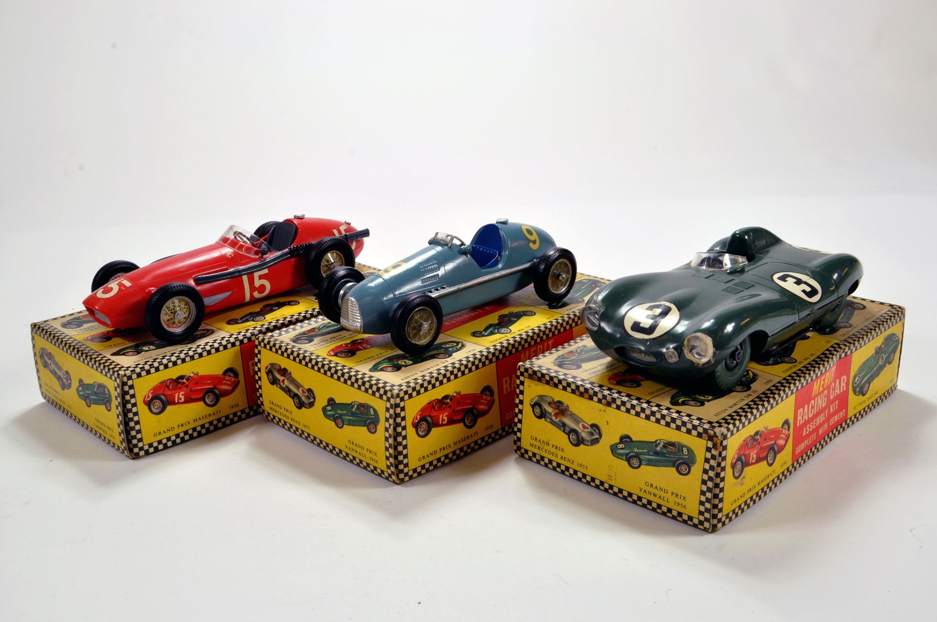 A trio of assembled Meric Plastic Racing Cars. Various issues. G to VG. (3)