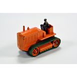 Moko clockwork Heavy Tractor finished in orange with orange metal rollers and green rubber tracks.