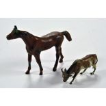 Unusual duo of cold painted bronze type metal figures comprising horse and cow. German made. (2)