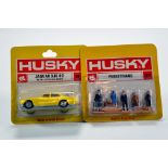 Duo of Husky issues comprising No. 39 Jaguar XJ6 and No. 1571 Pedestrians. E to NM in blister packs.