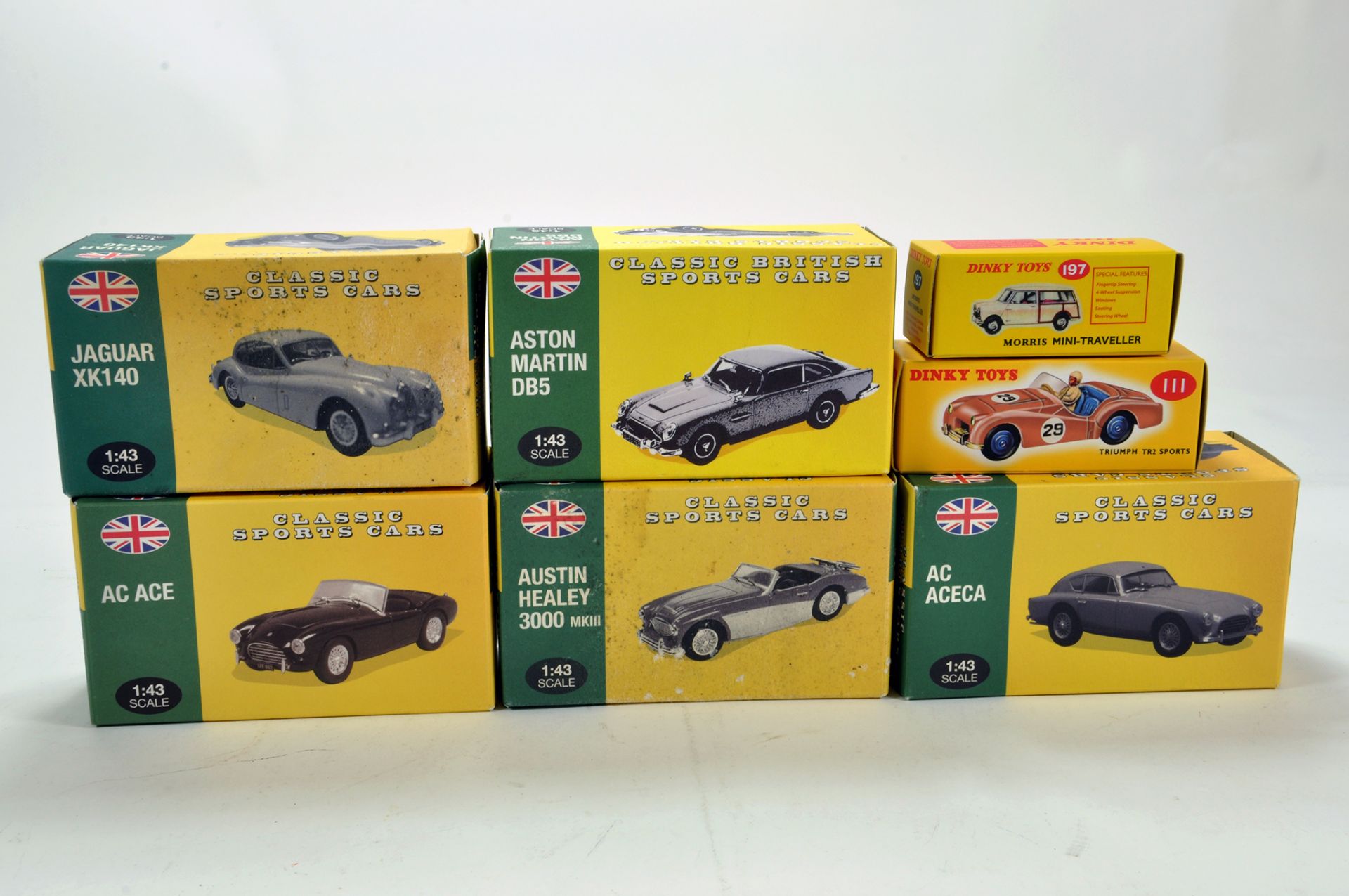 A group of diecast 1/43 Classic British Sports cars plus Dinky Atlas Issues. E to NM in Boxes. (7)