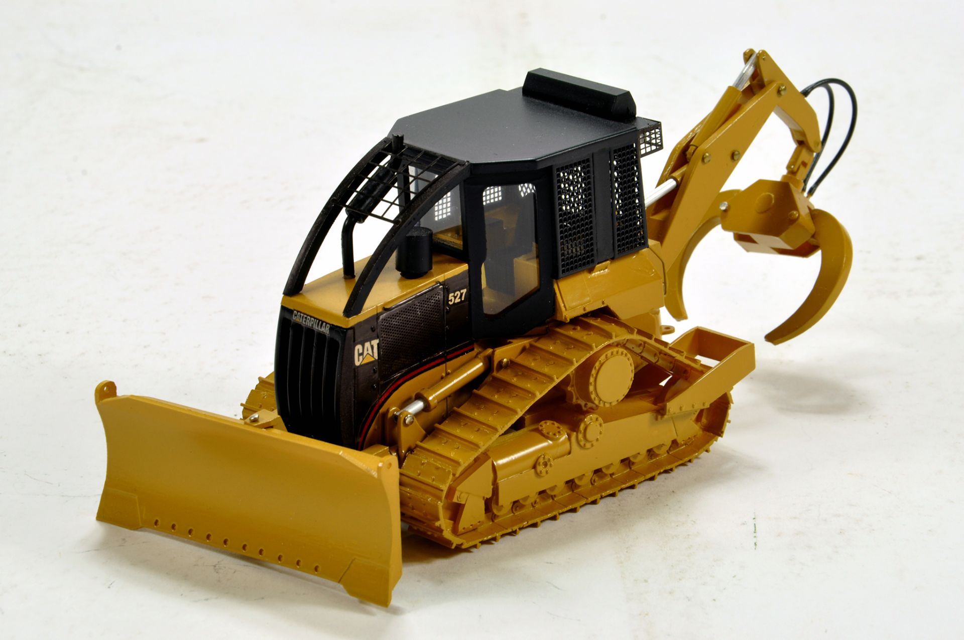 CYP Models (Romania) 1/50 construction issue comprising Resin CAT Caterpillar 527 Forestry Dozer