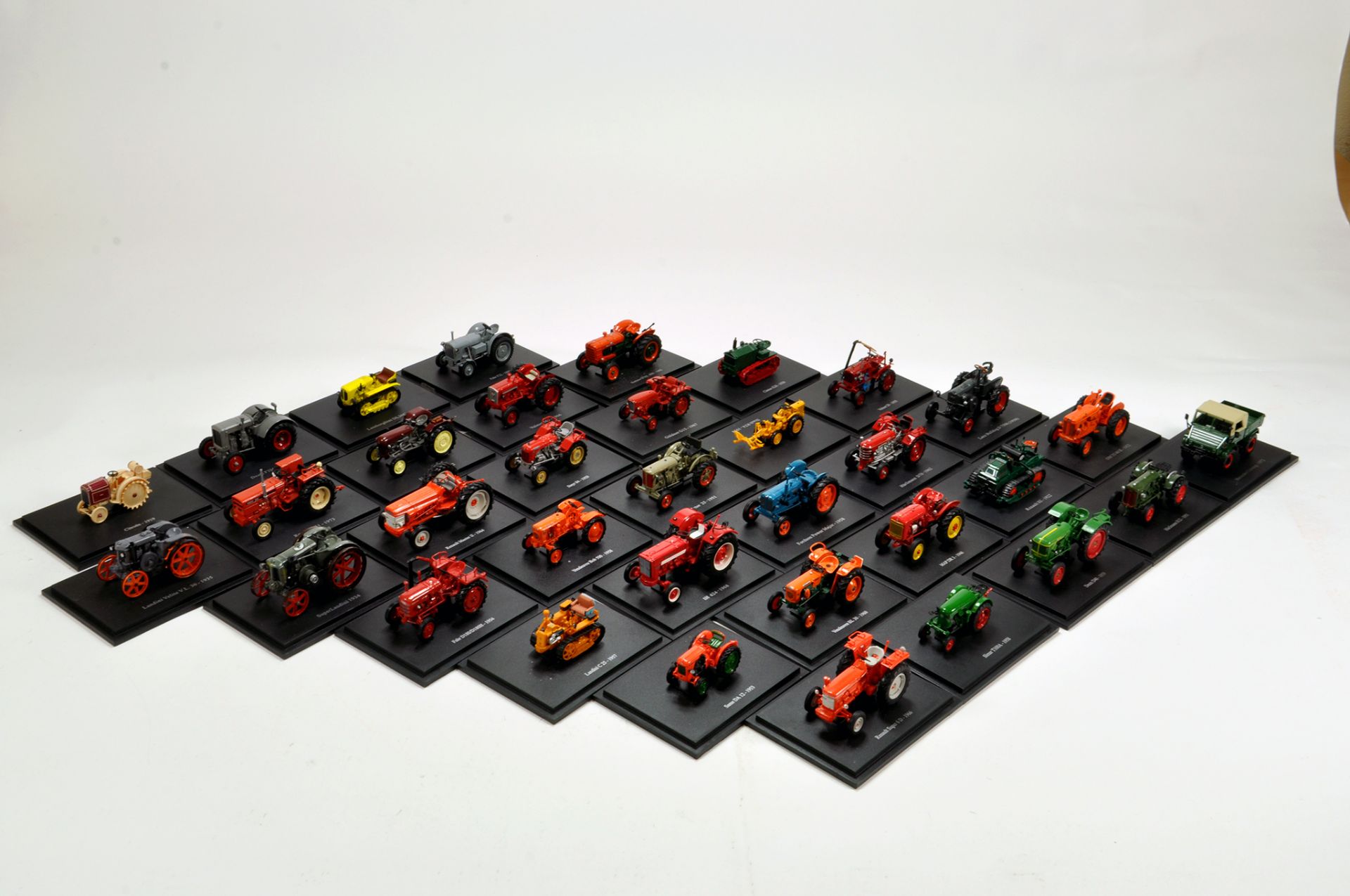 Universal Hobbies 1/43 diecast issues comprising tractor and world of farming collection.