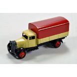 Dinky No. 25b Covered Wagon with cream body, red tin tilt, ridged hubs. Beautiful example is E to