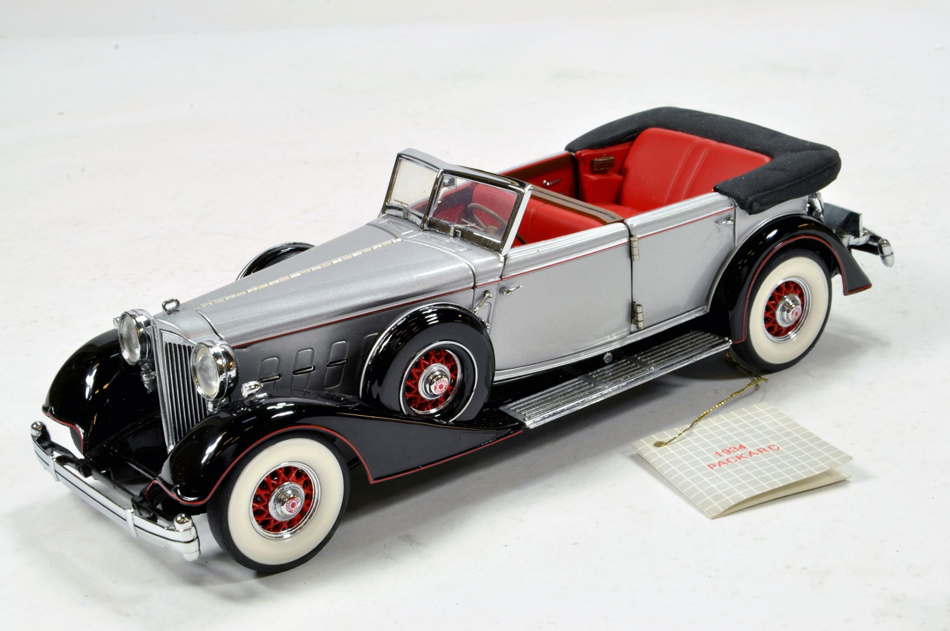 Franklin Mint 1/24 1934 Packard. Impressive highly detailed piece that displays well hence E to