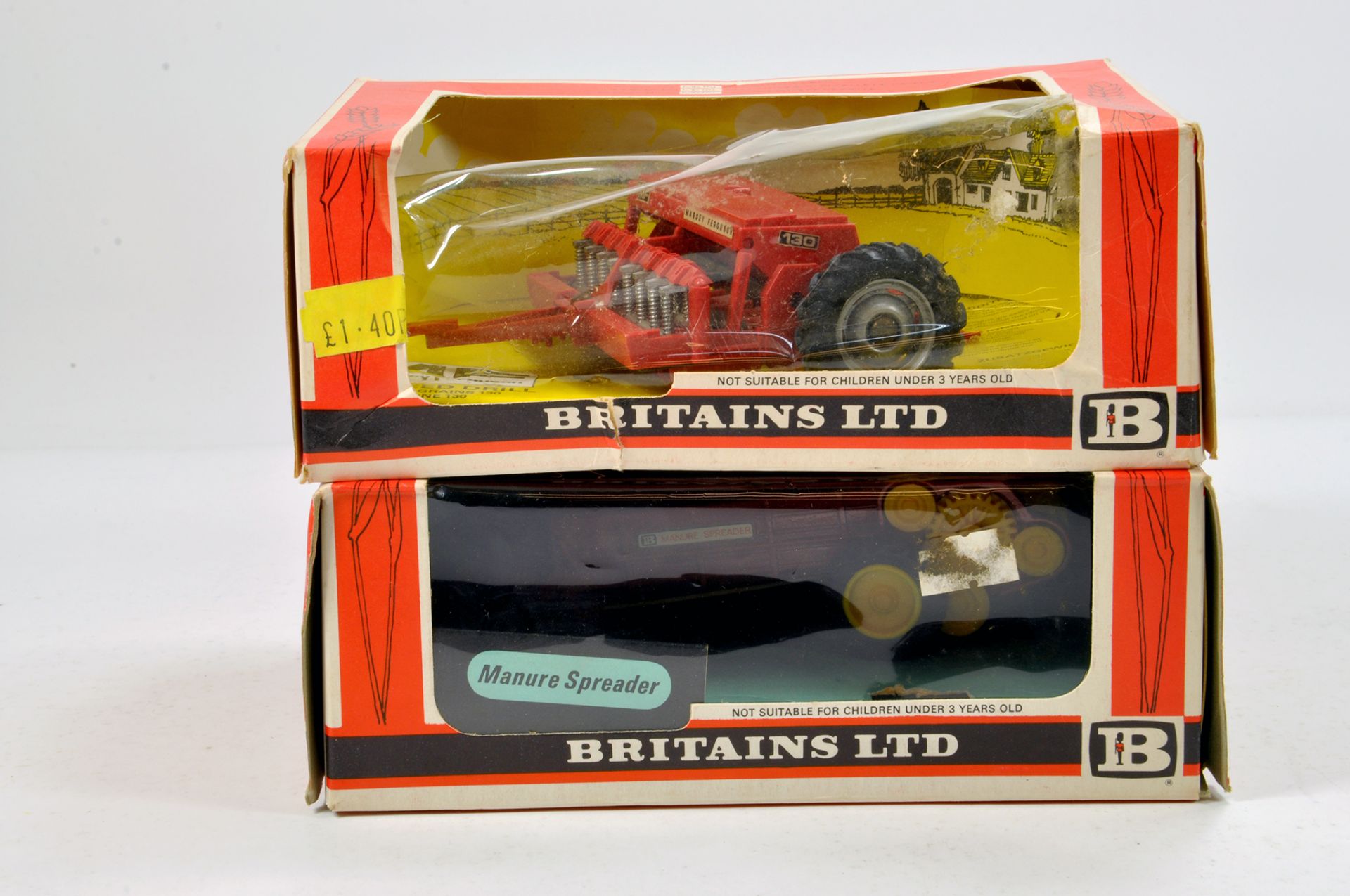 Britains 1/32 Farm Implement Group comprising boxed issues. Generally G to VG in F Boxes. (2)