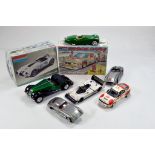 Various assembled plastic model car kits plus empty boxes. Monogram etc. Attention Needed.