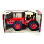 Ertl 1/16 International 3588 Snoopy Tractor. Nice example is E in Box.