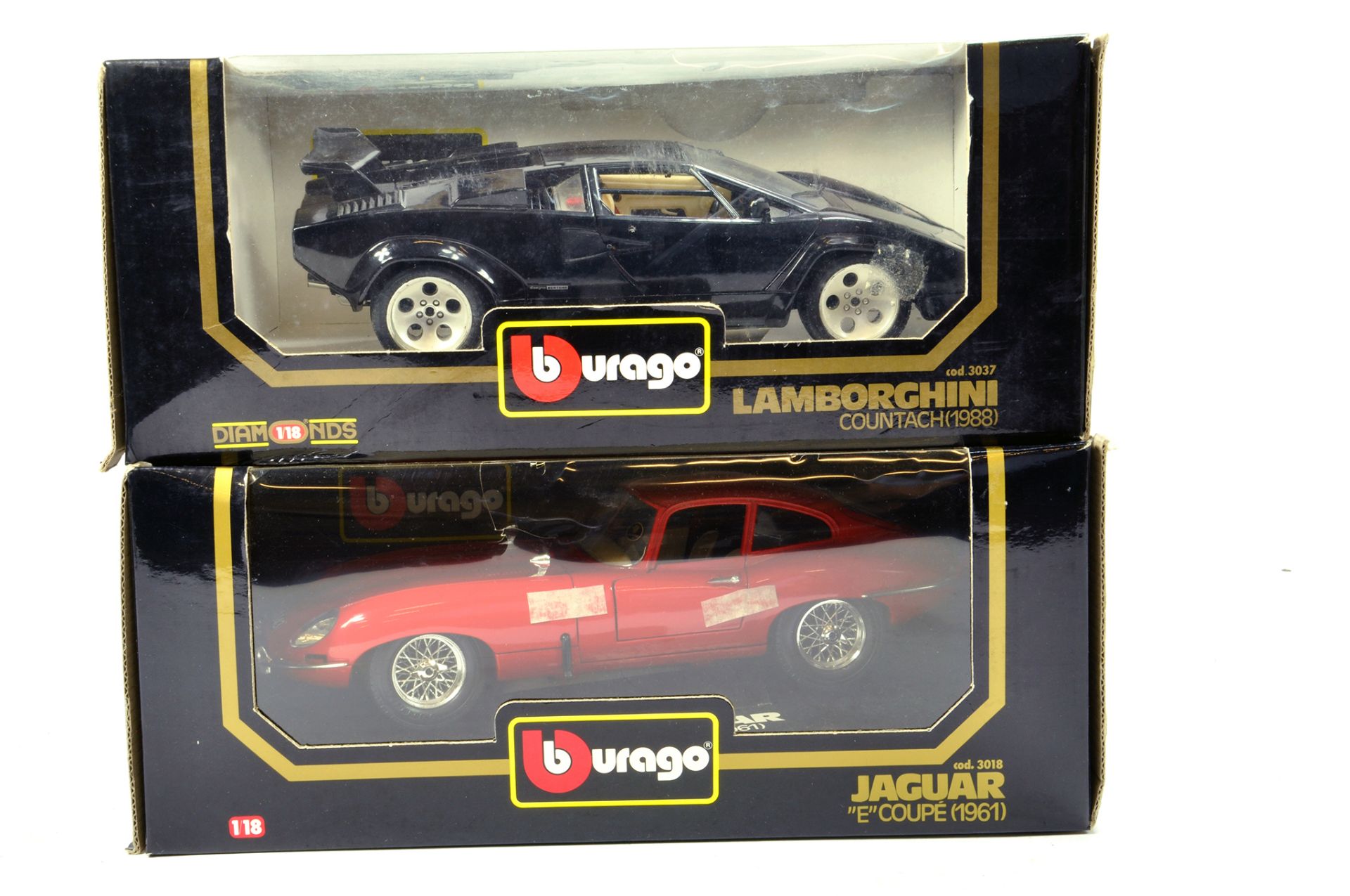 Burago 1/18 diecast duo comprising Lamborghini Countach and Jaguar E-Type. E to NM in Boxes. (2)