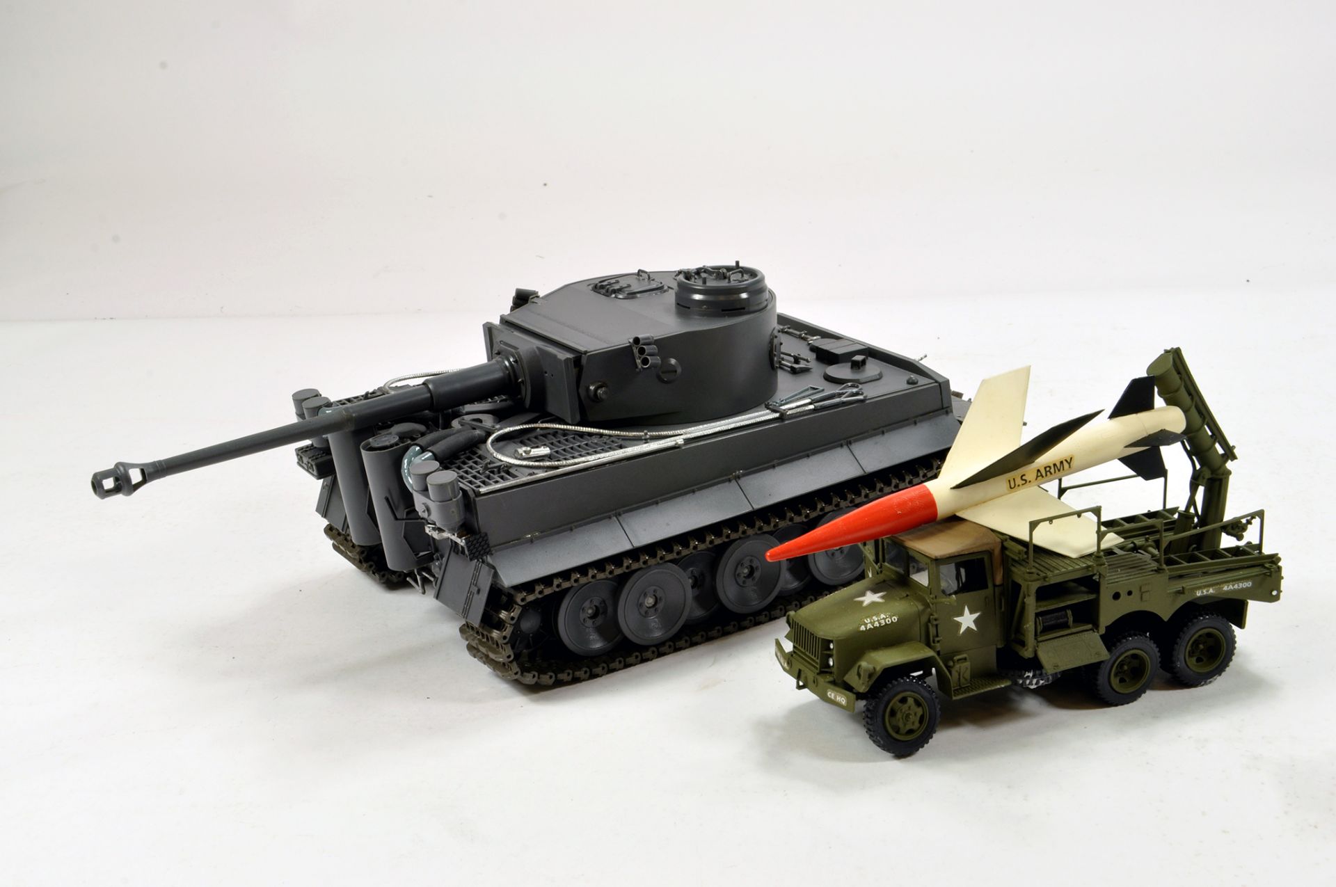 Duo of assembled Military Model Kits including Revell US Army Missile Carrier. Attention Needed. (