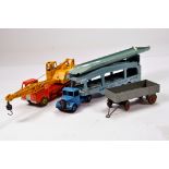 Dinky Unboxed Diecast group comprising Coles Crane, Car Transporter and Trailer. Generally G to