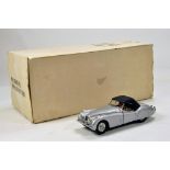 Franklin Mint 1/24 1952 Jaguar XK120. Impressive highly detailed piece that displays well hence E to