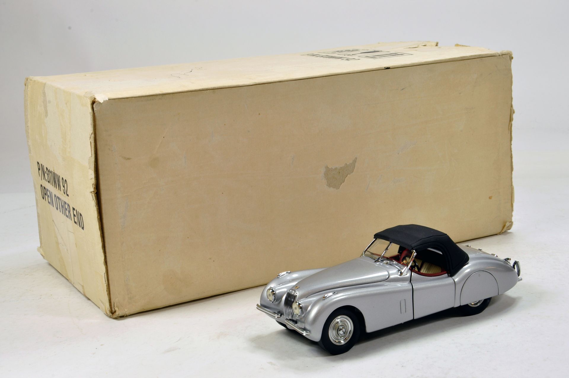 Franklin Mint 1/24 1952 Jaguar XK120. Impressive highly detailed piece that displays well hence E to