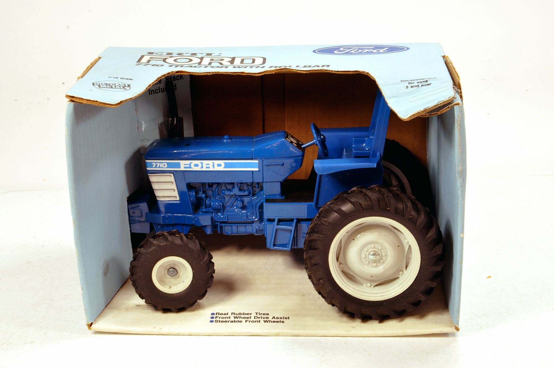 Ertl 1/16 Ford 7710 Tractor. Nice example is E in Box.