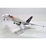 Fedex Model Aircraft on stand. Some attentioned needed hence G.