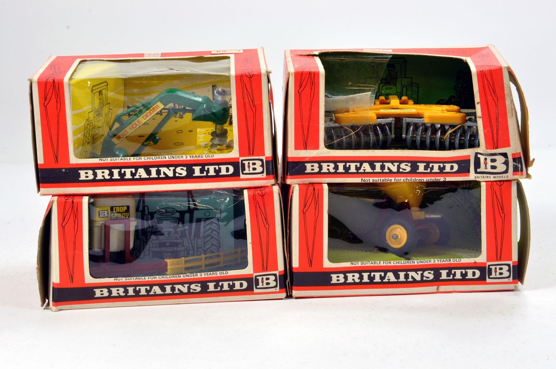 Britains 1/32 Farm Implement Group comprising boxed issues. Generally G to E in F Boxes. (4)