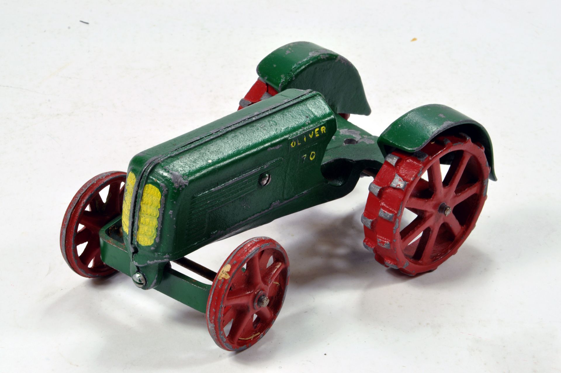 A very rare issue in approx 1/16 of the Oliver 70 Tractor with Steel Wheels.