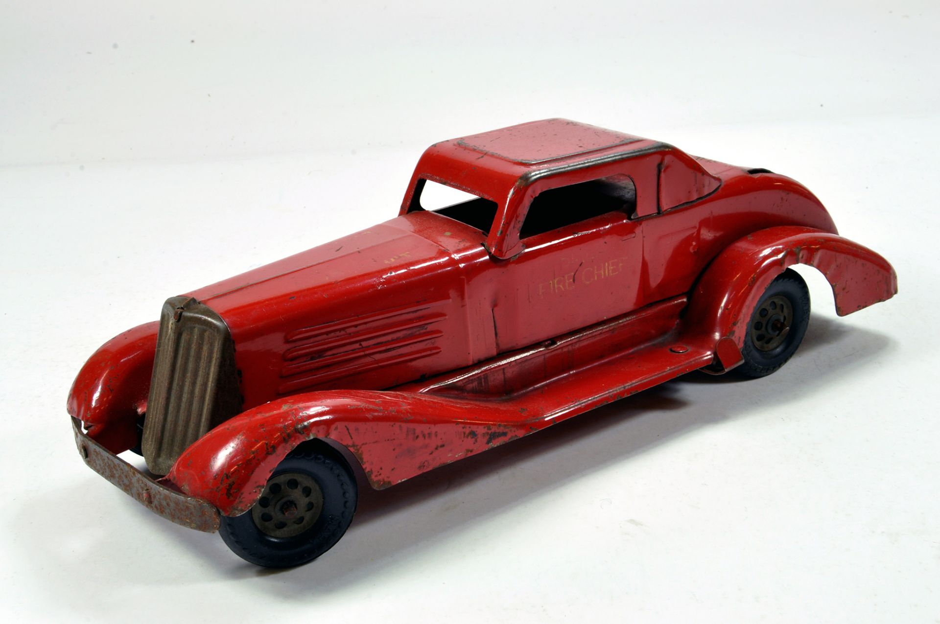 An early Marx 1930's Pressed Steel Wind up Fire Chief Car with Siren. Untested but displays very