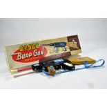 Scarce Chinese Issue of a Friction Operated Burp Gun. Well preserved toy in original box.