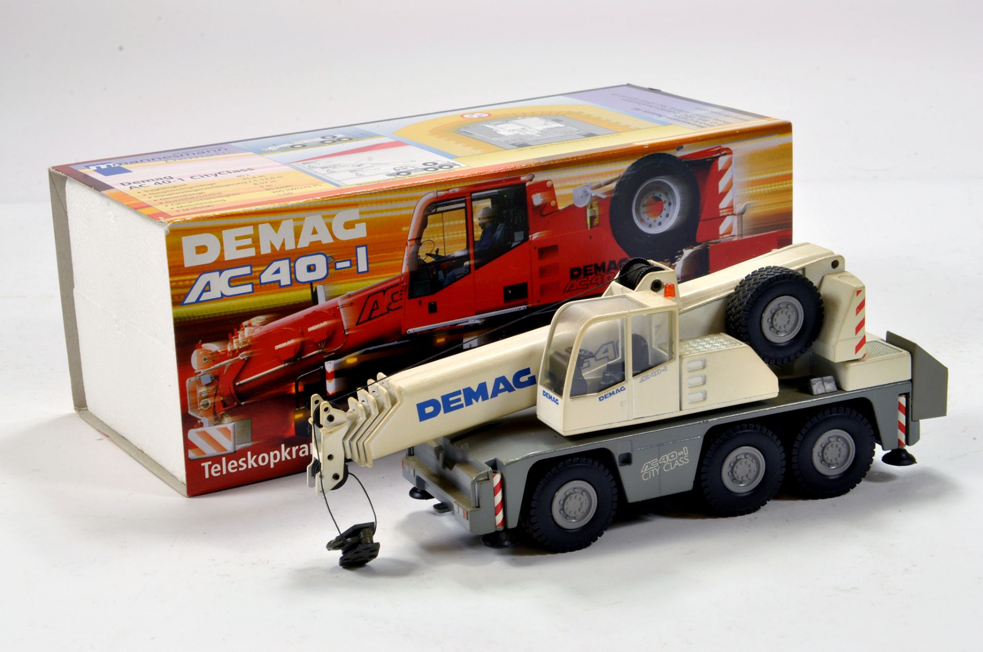 Conrad 1/50 construction issue comprising Demag AC40-1 Crane Truck. Generally VG to E.