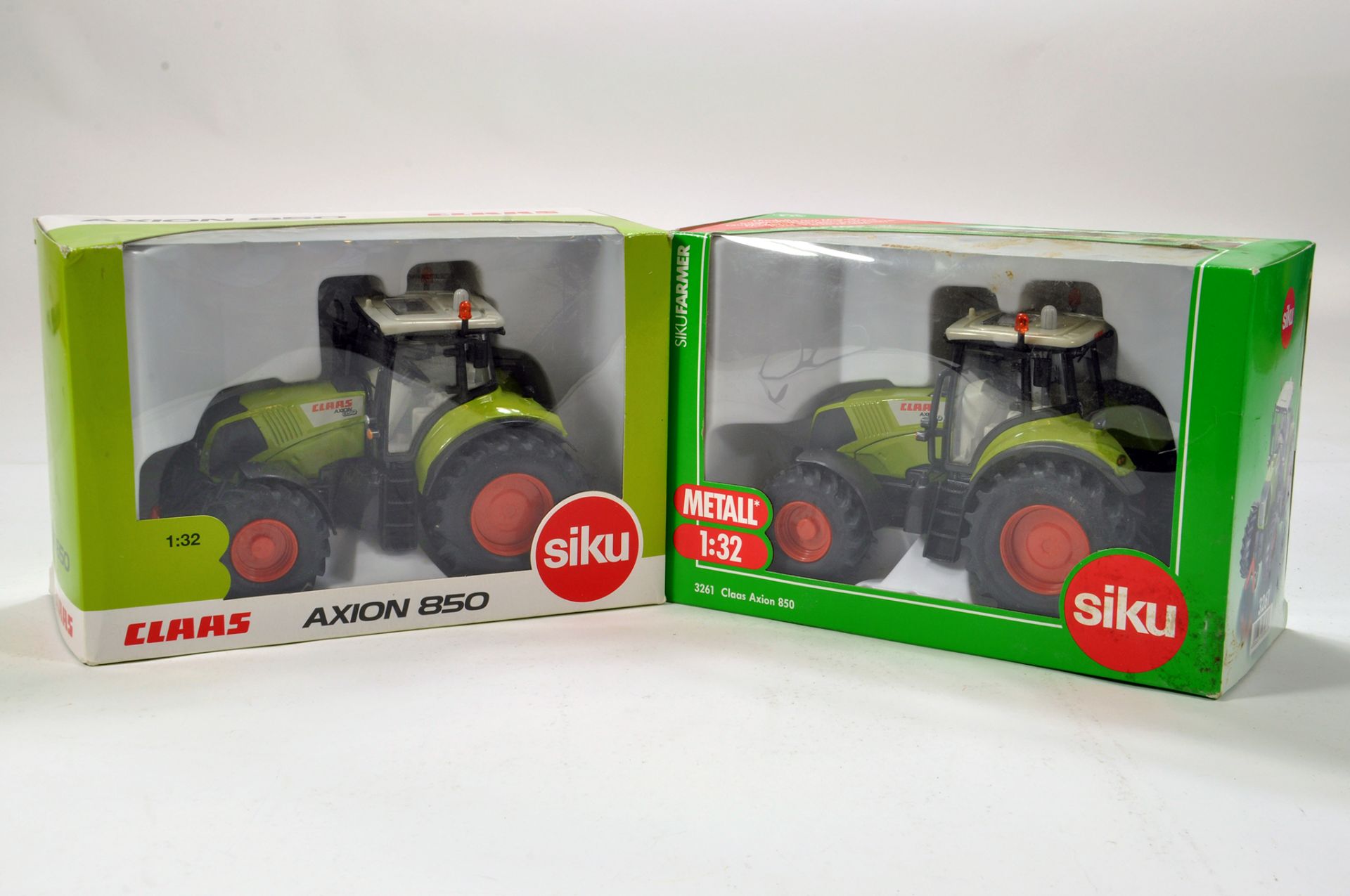 Siku 1/32 Farm Issue duo comprising Claas Axion Tractor models. Generally E to NM. (2)
