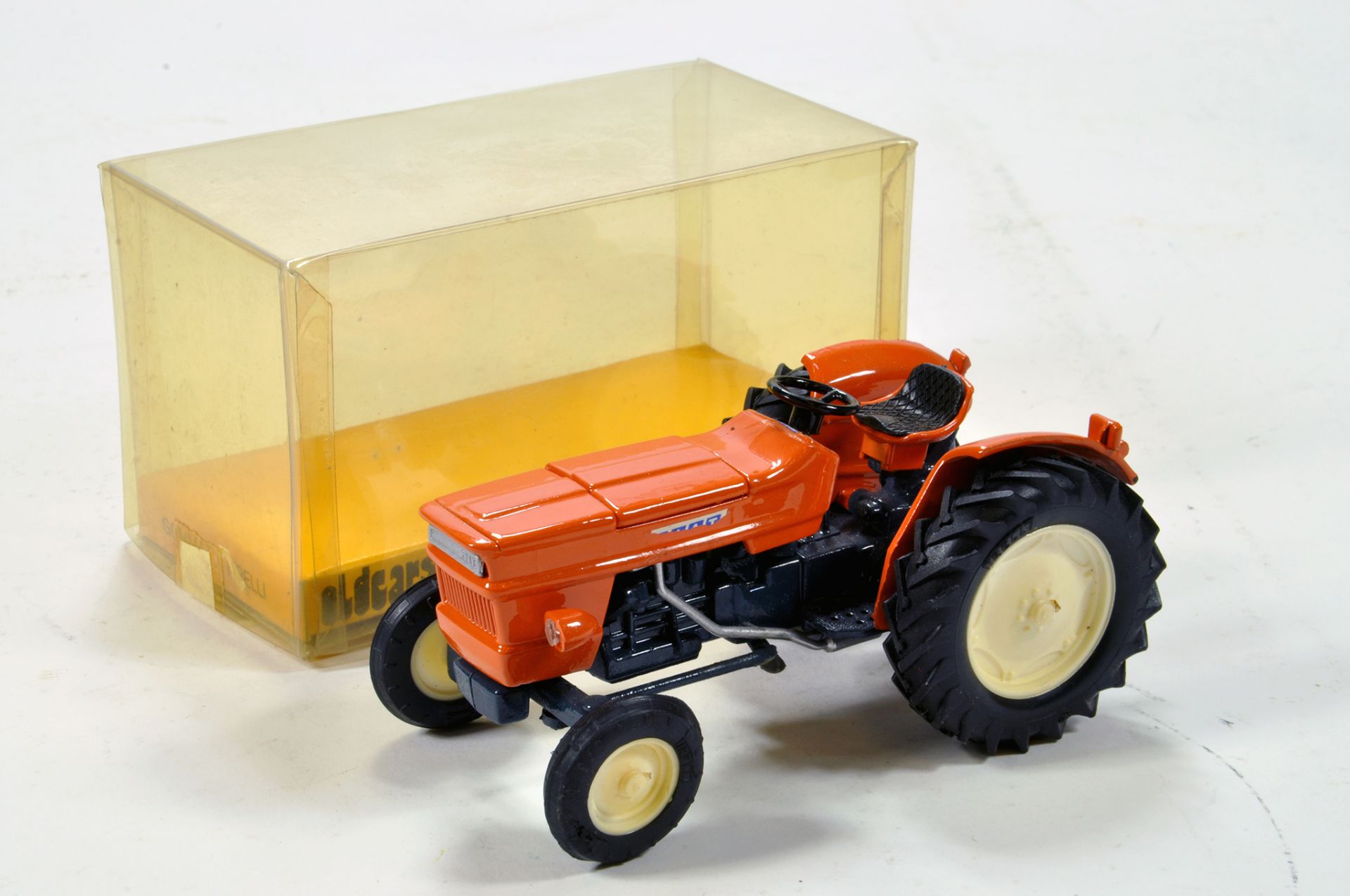 Old Cars / Dugu Type Fiat Tractor in orange. Generally a VG example with decal fading. Box is G.