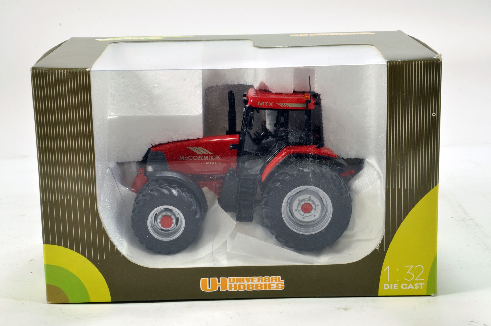 Universal Hobbies 1/32 McCormick MTX155 Tractor on duals. E to NM with Box.