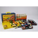 Matchbox Carry Case duo plus various diecast vehicles from various makers. Majorette, Matchbox and