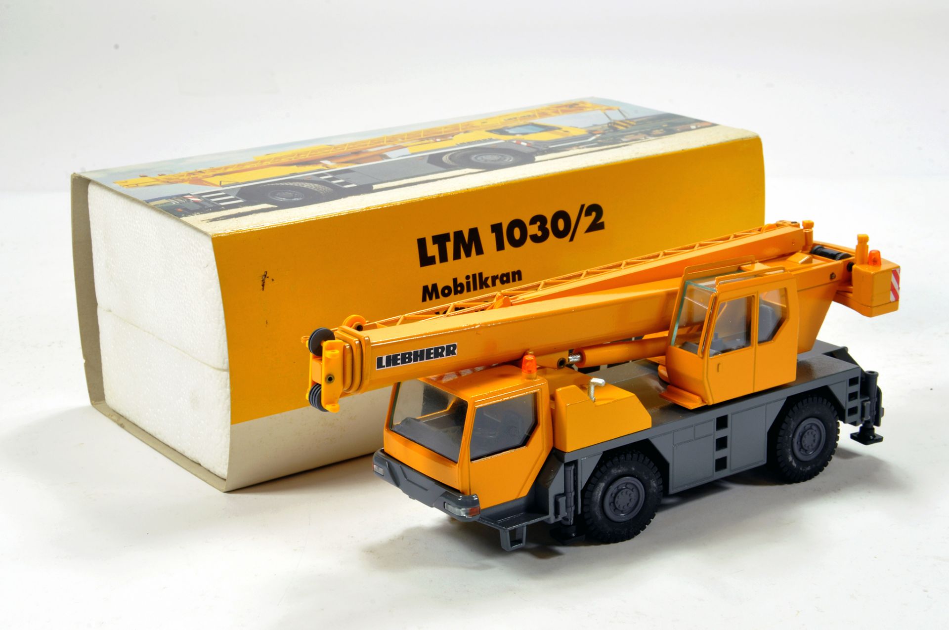 Conrad 1/50 construction issue comprising Liebherr LTM 1030/2 Mobile Crane. E to NM.