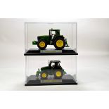 Siku 1/32 Farm Issue comprising duo of John Deere Tractor models in cases. E to NM.